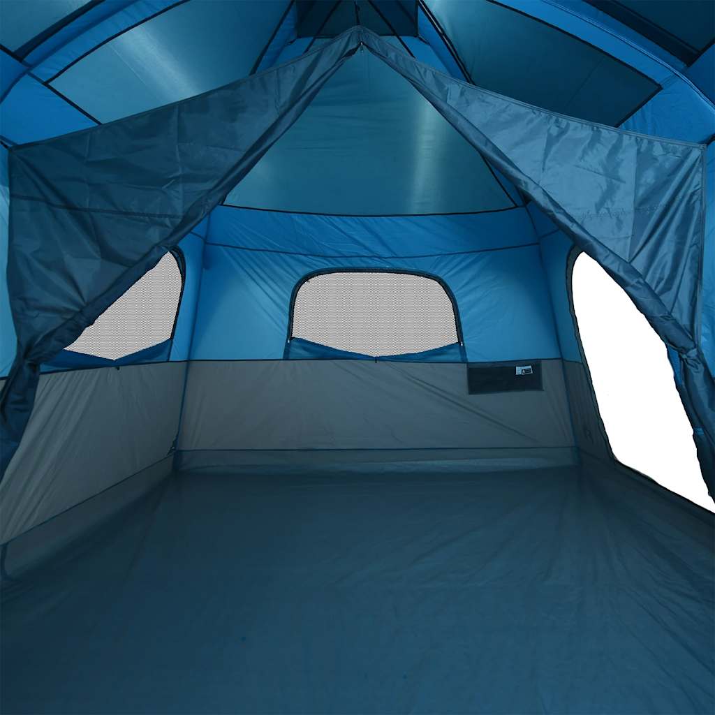 Zijaanzicht van de binnenkant van de vidaXL gezinstent, met blauwe wanden en ventilatieroosters.