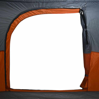 Detail van de oranje tent van vidaXL met waterdichte ingang en gaasventilatie.