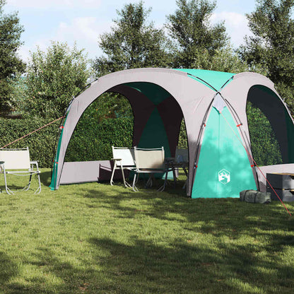 Zijaanzicht van de groene vidaXL partytent met open zijkanten en zitplaatsen eronder.