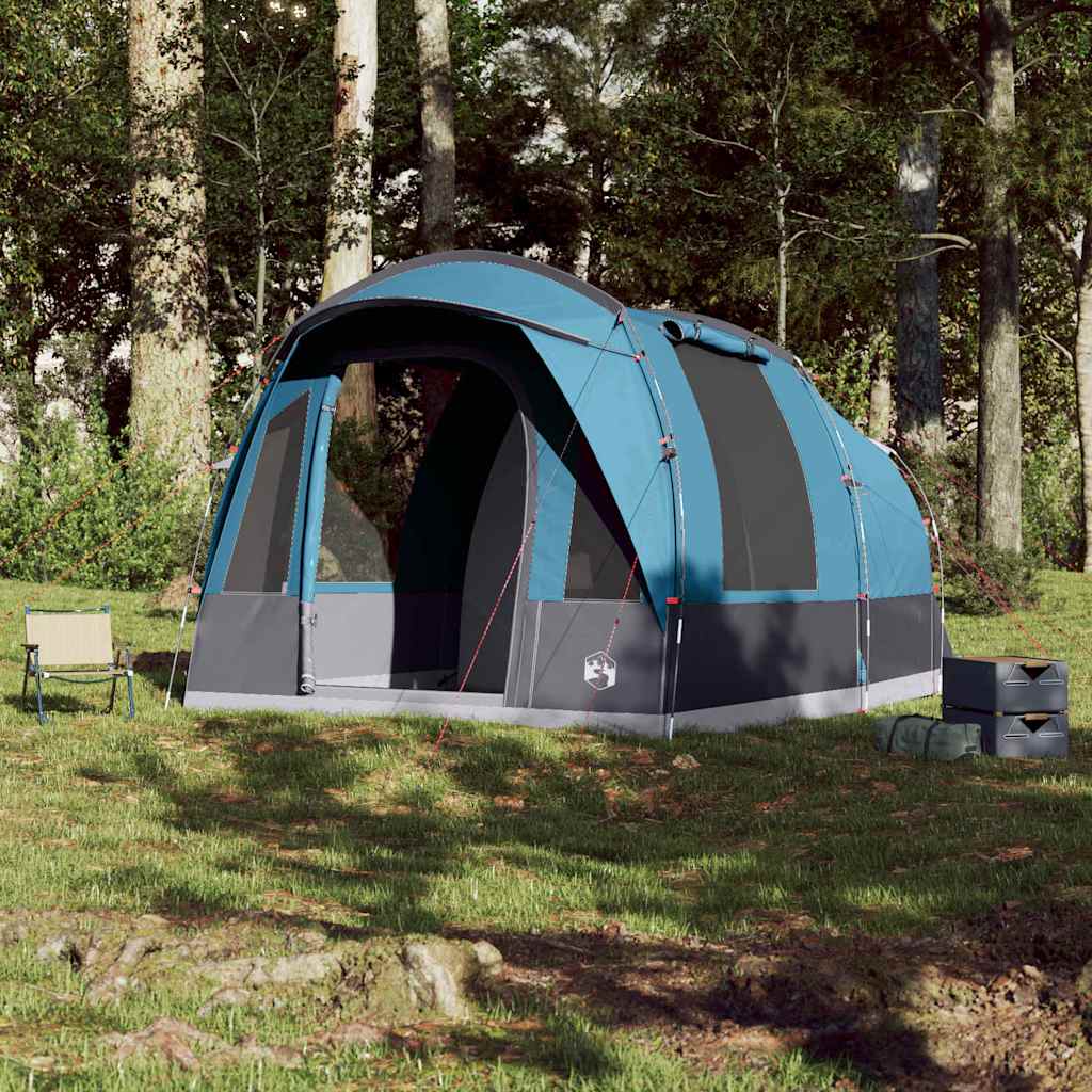 Zijaanzicht van de vidaXL 3-persoons tunneltent in blauw, opgesteld in de natuur.