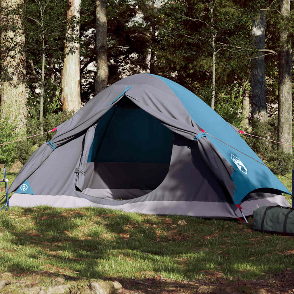 Koepeltent vidaXL 2-persoons in blauw, waterdicht met open ingang in bosrijke omgeving.