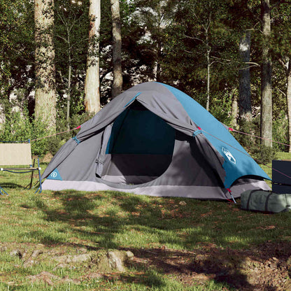 Zijaanzicht van de vidaXL koepeltent in blauw, met open ingang en gaaswanden.