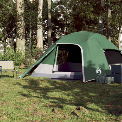 Detail van de vidaXL koepeltent in groen, zijaanzicht met open ingang en campingstoelen ernaast.