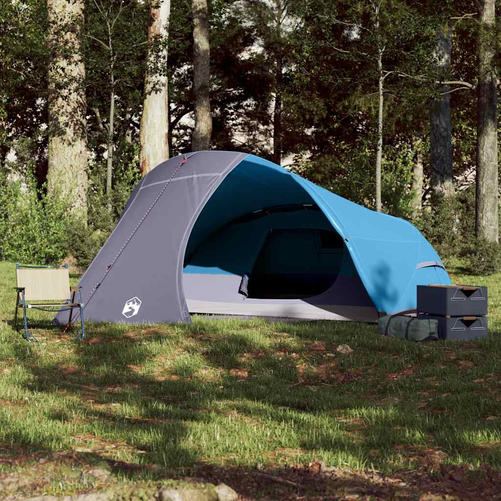 Detail van de vidaXL koepeltent in blauw, met open ingang en groene omgeving.
