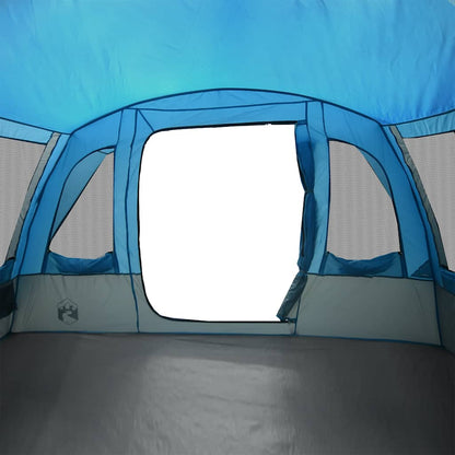 Binnenkant van de vidaXL tunneltent met open deur en blauwe tentdoek.