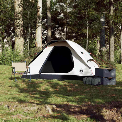 Zijaanzicht van de vidaXL koepeltent in een groene omgeving met campingstoelen en opbergtassen.