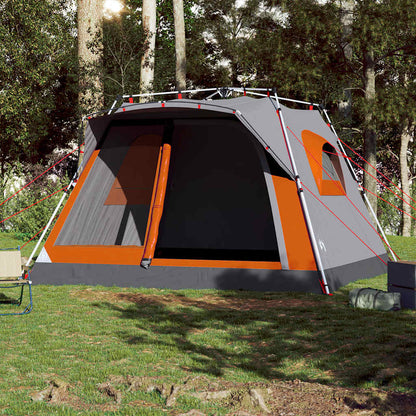 Zijaanzicht van de vidaXL 7-persoons tent met grijze en oranje details.