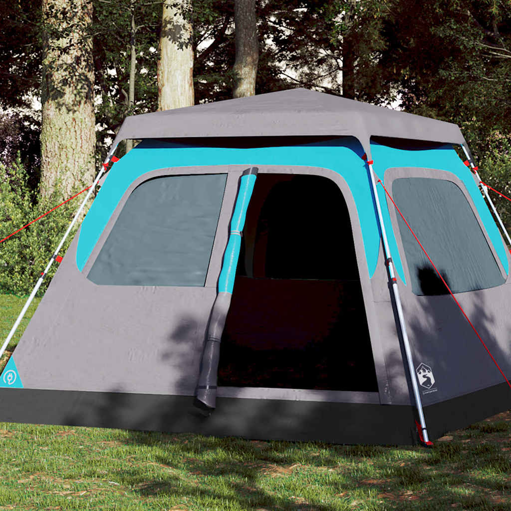 Blauwe vidaXL koepeltent voor vier personen met snelontgrendeling, opgezette tent in het bos.