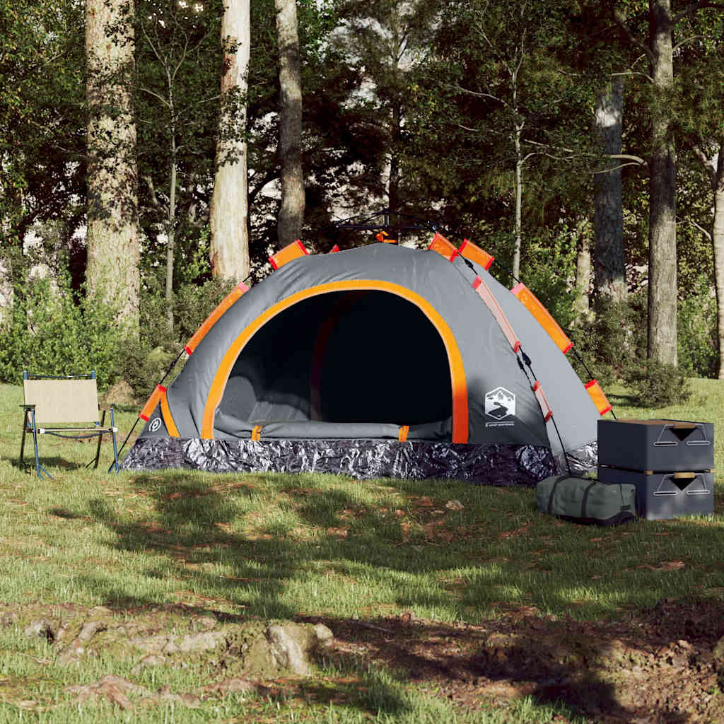 Detail van de vidaXL 4-persoons tent in grijs met oranje accenten, opgezette tent in bosrijke omgeving.