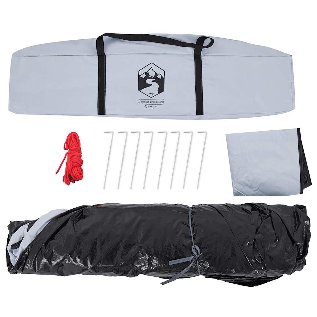 Detail van de verpakking en accessoires van de vidaXL koepeltent, inclusief haringen en een opbergtas.
