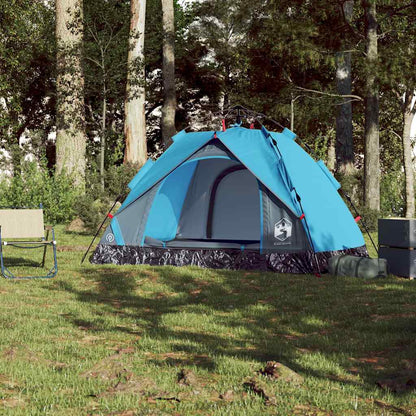 Zijaanzicht van de vidaXL koepeltent in blauw, opgezet in een bosrijke omgeving.