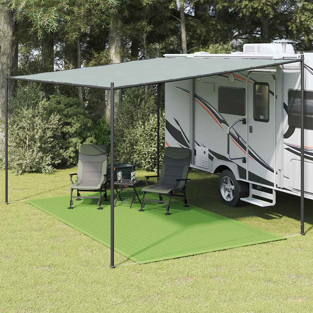 Lichtgroen vidaXL tenttapijt van 200x300 cm onder een caravanluifel met stoelen.