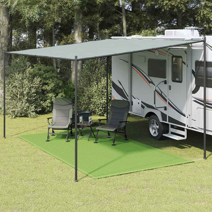 Lichtgroen vidaXL tenttapijt van 200x300 cm onder een caravanluifel met stoelen.