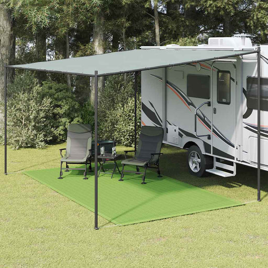 Lichtgroen vidaXL tenttapijt van 200x300 cm onder een caravanluifel met stoelen.