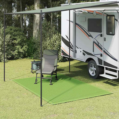 Lichtgroen vidaXL tenttapijt van 250x300 cm onder een caravanluifel met een stoel.