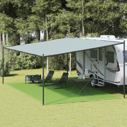 Lichtgroen vidaXL tenttapijt 400x600 cm onder een caravanluifel met stoelen en tafel.