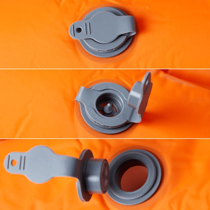 Detail van de zelfopblazende klep van het vidaXL kampeermatras in oranje.