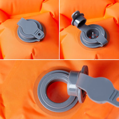 Detail van het ventiel van het vidaXL opblaasbare kampeermatras in oranje.