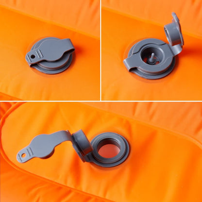 Detail van de zelfopblazende klep van het vidaXL kampeermatras in oranje.