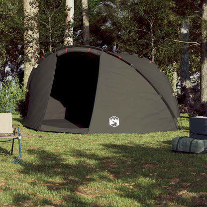 Zijaanzicht van de vidaXL Vistent tent in bruin, met open ritsdeur en groene omgeving.