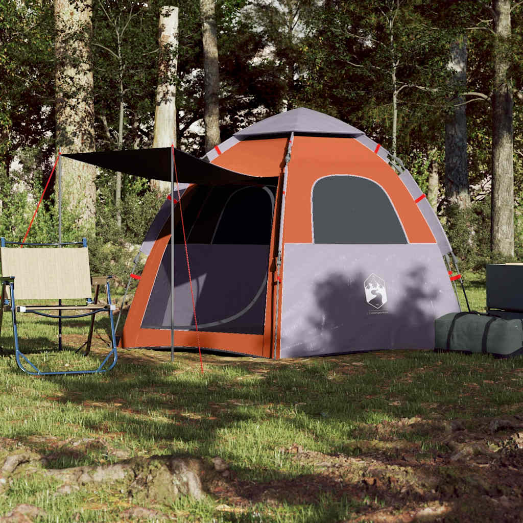 Detail van de vidaXL 4-persoons kampeertent in grijs en oranje, met luifel en stoelen ernaast.