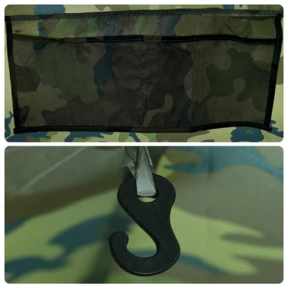 Detail van de camouflage tent met handige opbergruimte en haak voor accessoires.