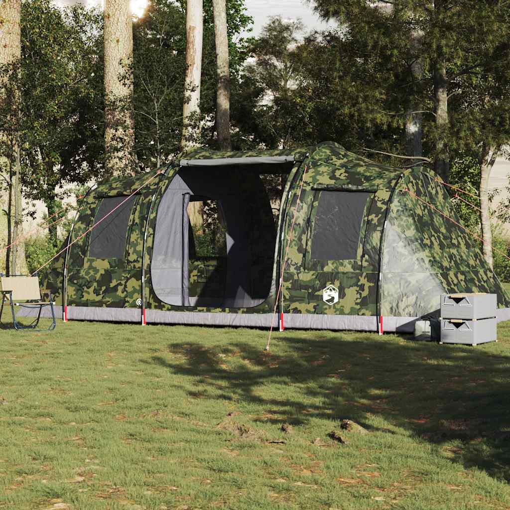 Zijaanzicht van de vidaXL 4-persoons camouflage tunneltent in een groene omgeving.