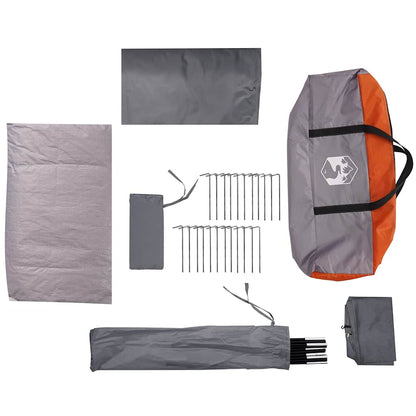 Detail van de accessoires van de vidaXL 5-persoons tunneltent, inclusief stokken en haringen.