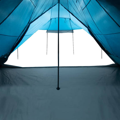 Detail van de binnenkant van de vidaXL tipitent met blauwe tentdoek en centrale steunstok.