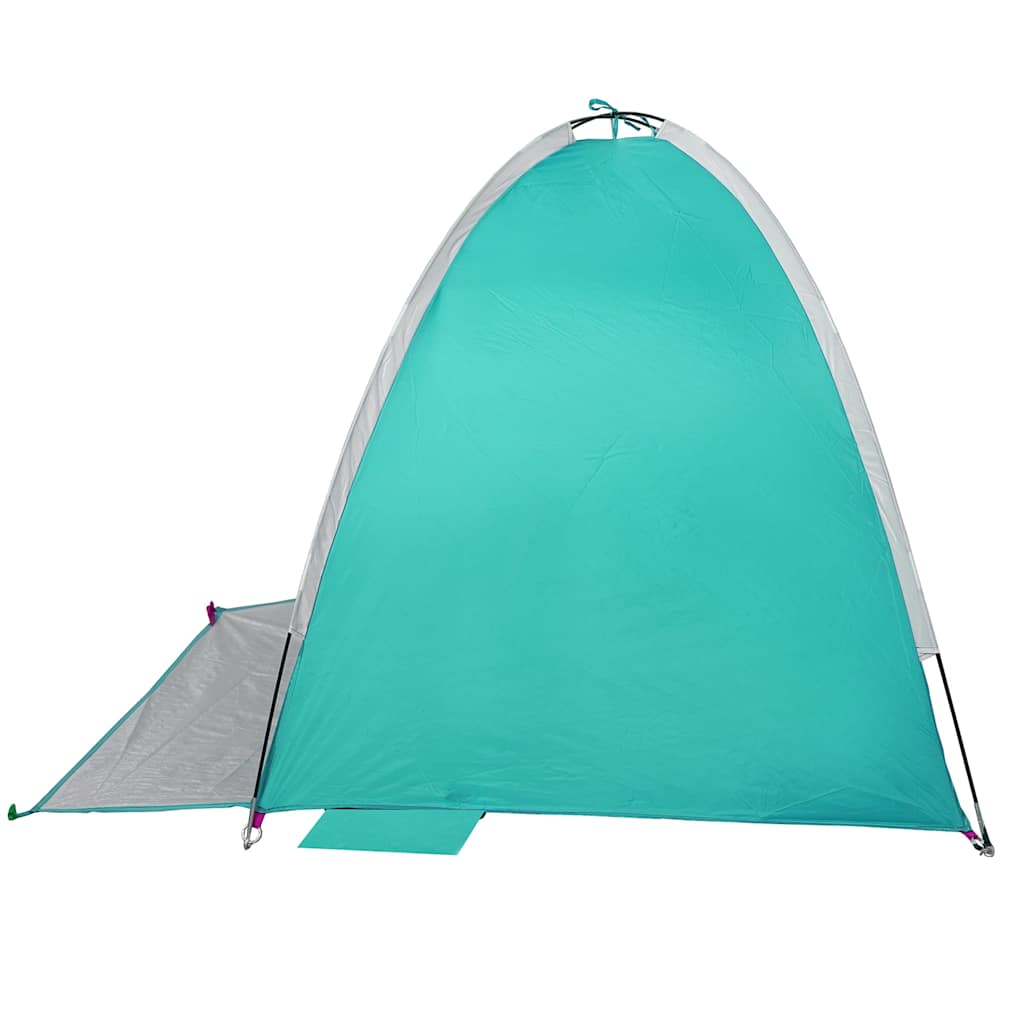 Zijaanzicht van de waterdichte zeegroene vidaXL strandtent met open deur.