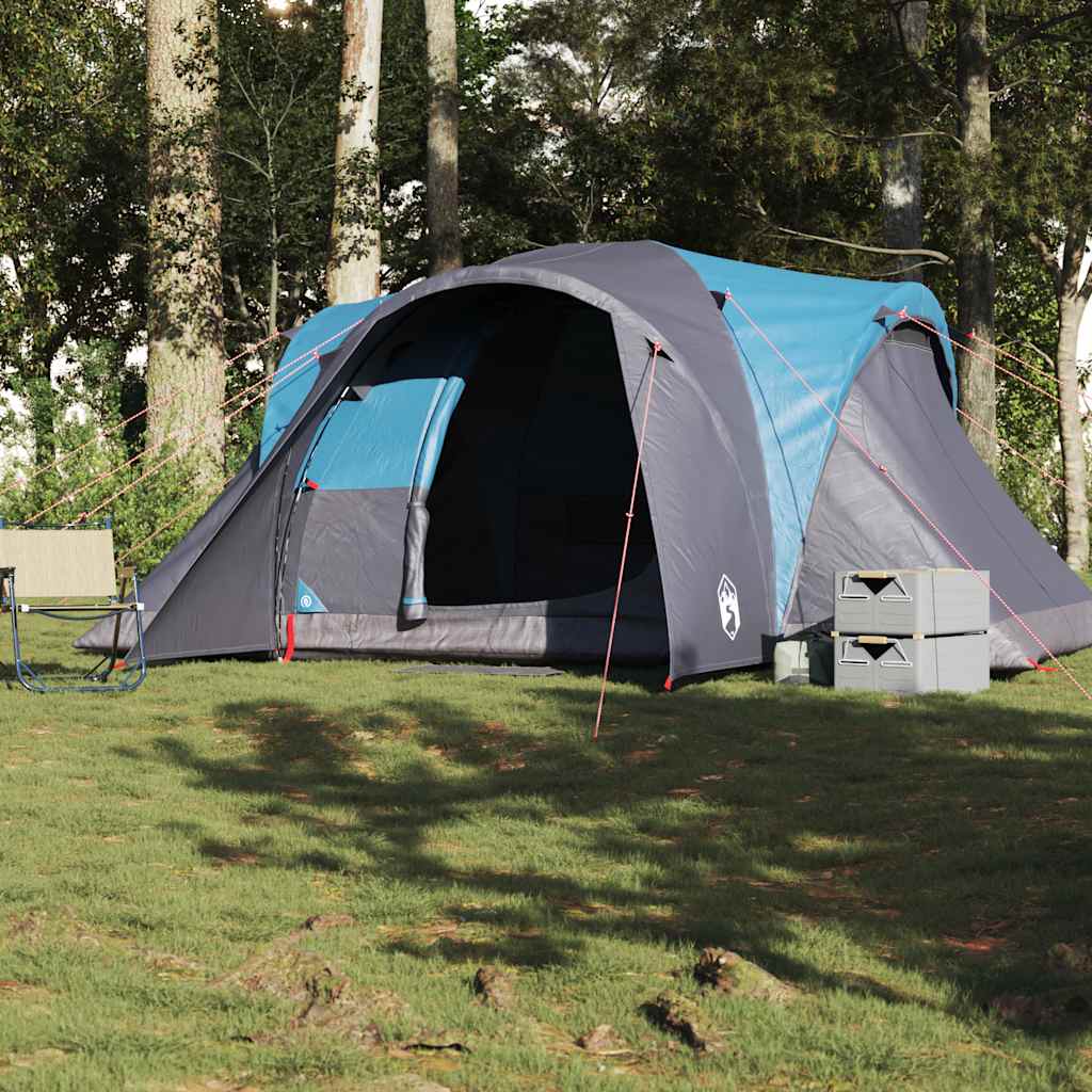 Zijaanzicht van de vidaXL koepeltent in blauw, met open ingang en tentstokken zichtbaar.