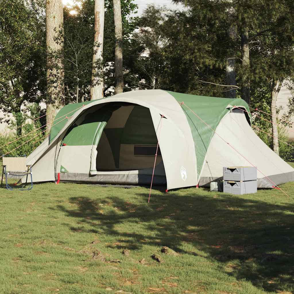 Zijaanzicht van de vidaXL koepeltent in groen en beige, op een grasveld.