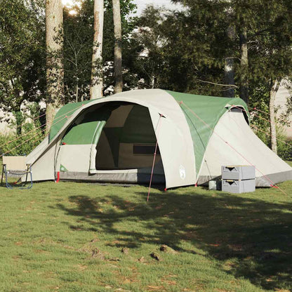 Zijaanzicht van de vidaXL koepeltent in groen en beige, op een grasveld.