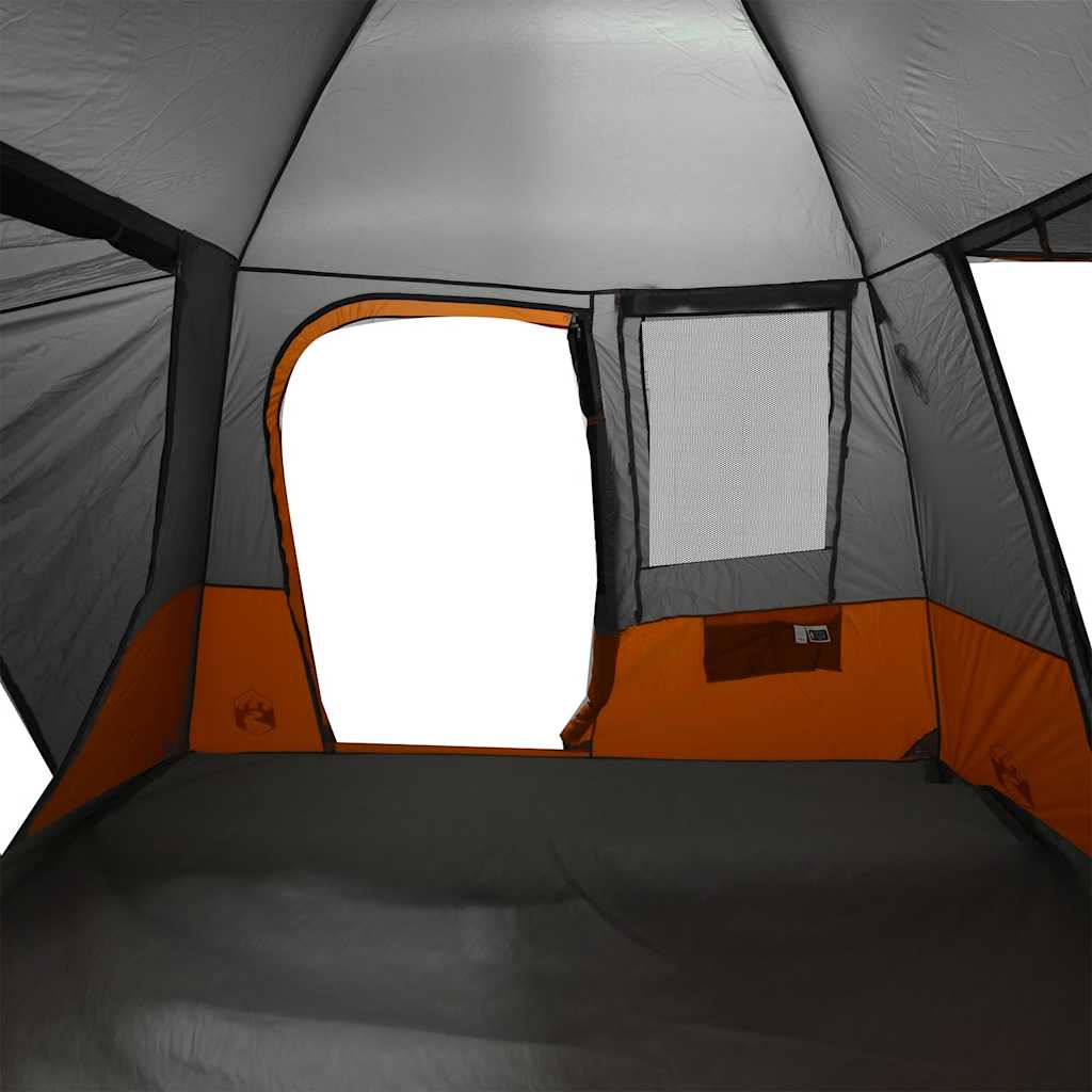 Detail van de binnenkant van de vidaXL autotent met grijze wanden en oranje accenten.