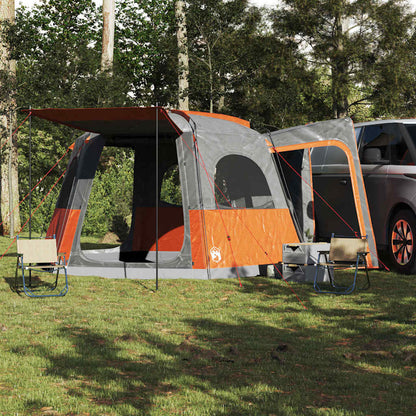 Detail van de vidaXL autotent in grijs en oranje, opgesteld naast een voertuig.