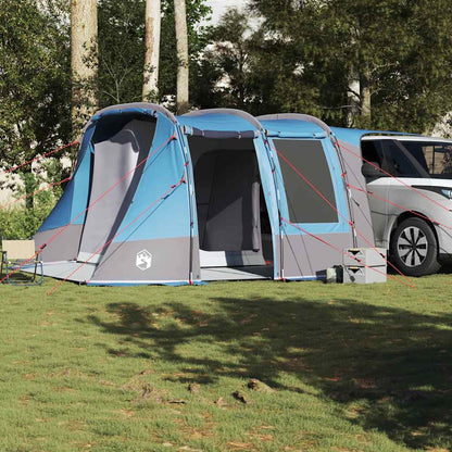Detail van de vidaXL autotent in blauw, opgezette tent naast een auto in een groene omgeving.