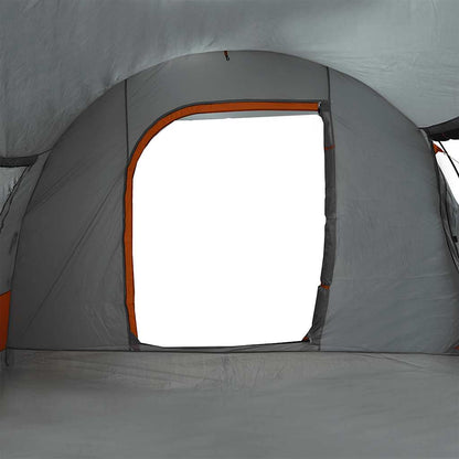 Detail van de grijze vidaXL autotent met oranje randen en open toegangspunt.