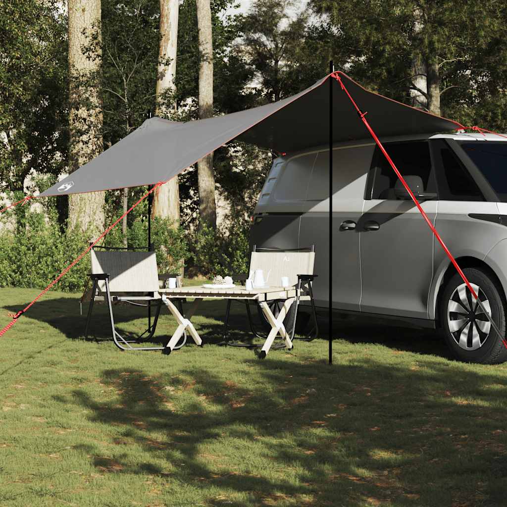 Detail van de vidaXL autotent met grijze luifel en opgezette campingtafel naast een voertuig.