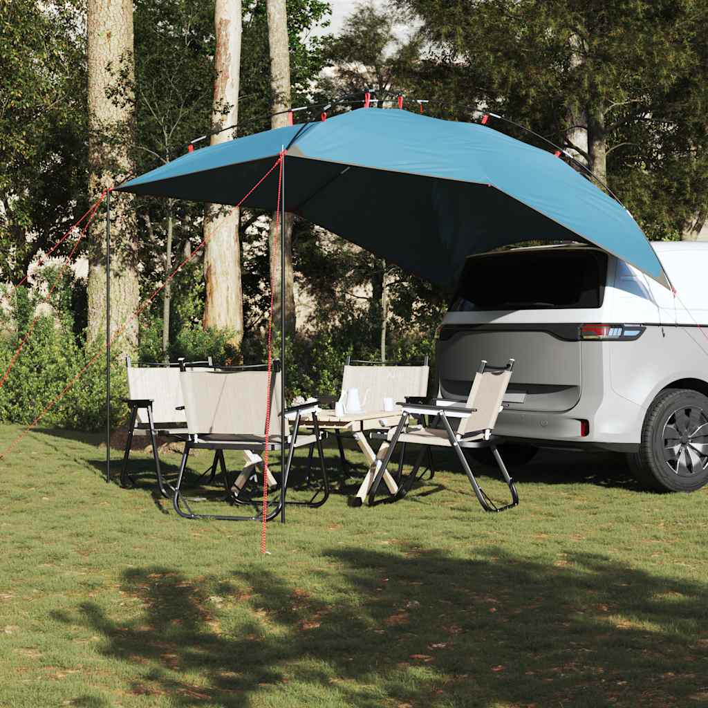 Zijaanzicht van de vidaXL autotent in blauw met opgezette schaduwdoek en campingstoelen.