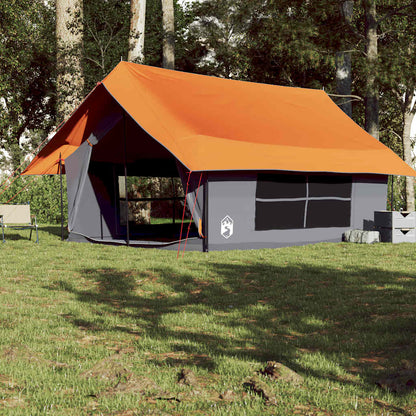 Zijaanzicht van de vidaXL 5-persoons tent met grijs en oranje doek in een groene omgeving.