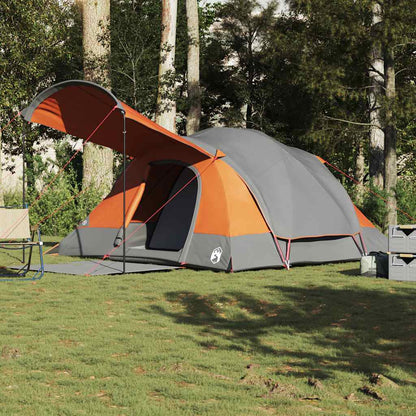 Detail van de vidaXL tunneltent in grijs en oranje met opgezette luifel.