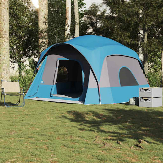 Blauwe vidaXL 6-persoons tent met waterdicht ontwerp in een groene omgeving.