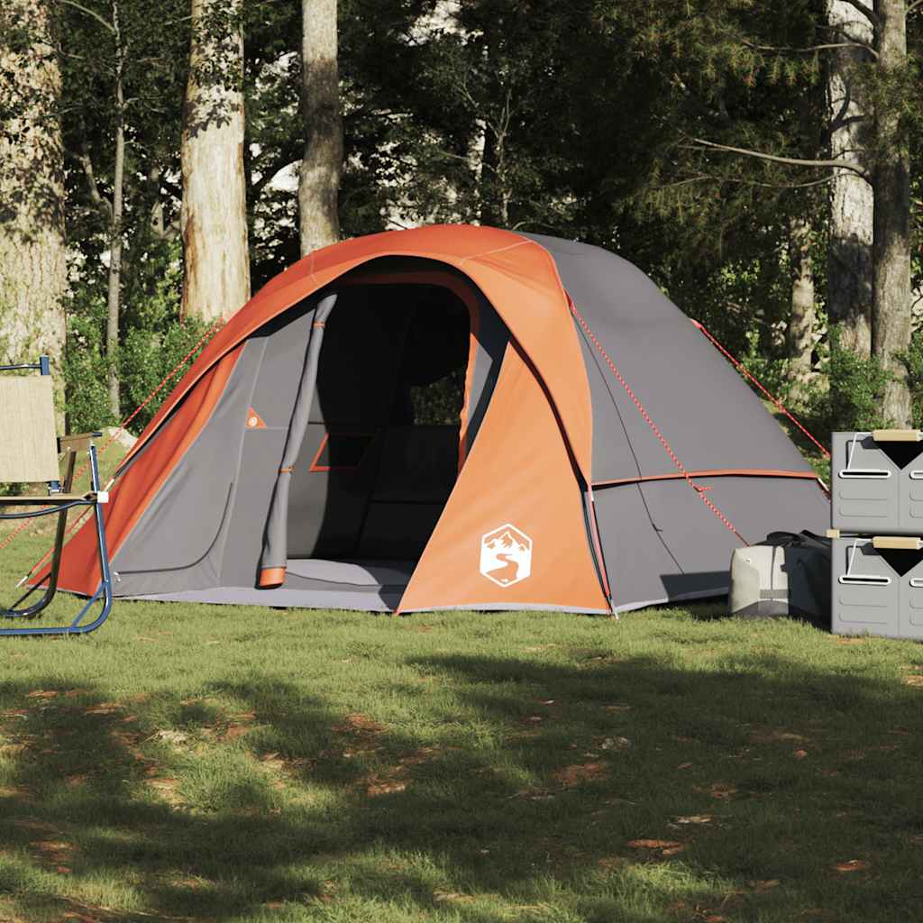 Zijaanzicht van de vidaXL 4-persoons tent in grijs en oranje, opgesteld op gras.