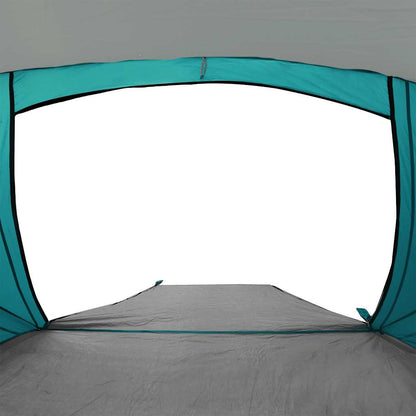 Zijaanzicht van de vidaXL strandtent in zeegroen met open ingang.