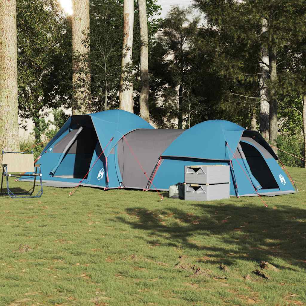 Zijaanzicht van de vidaXL 5-persoons tent in blauw, geplaatst op gras met bomen op de achtergrond.