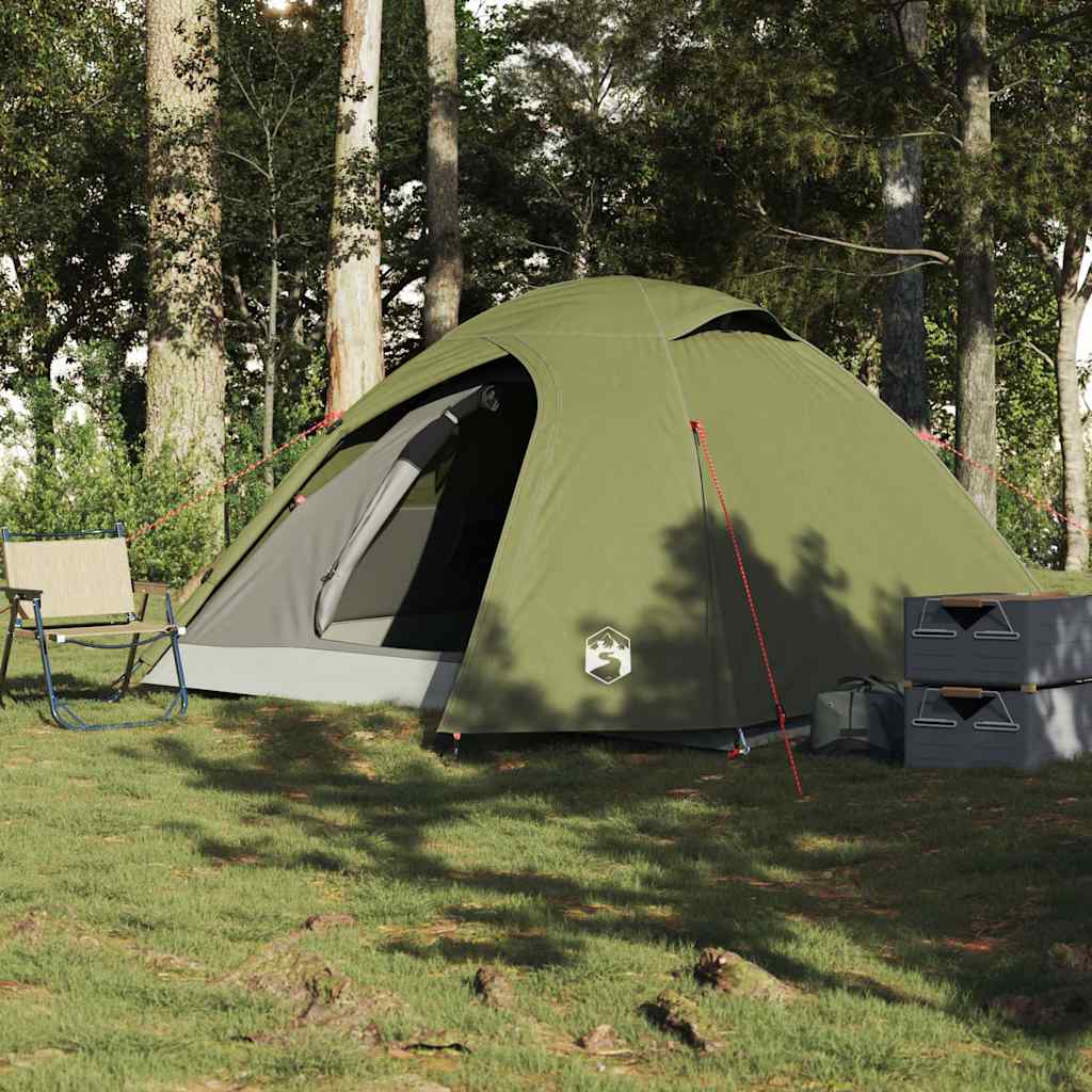 Zijaanzicht van de vidaXL koepeltent in olijfgroen, geplaatst op gras met een stoel en opbergboxen.