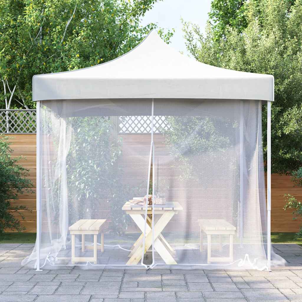 Witte vidaXL klamboe voor buiten met gaas, geplaatst bij een partytent in de tuin.