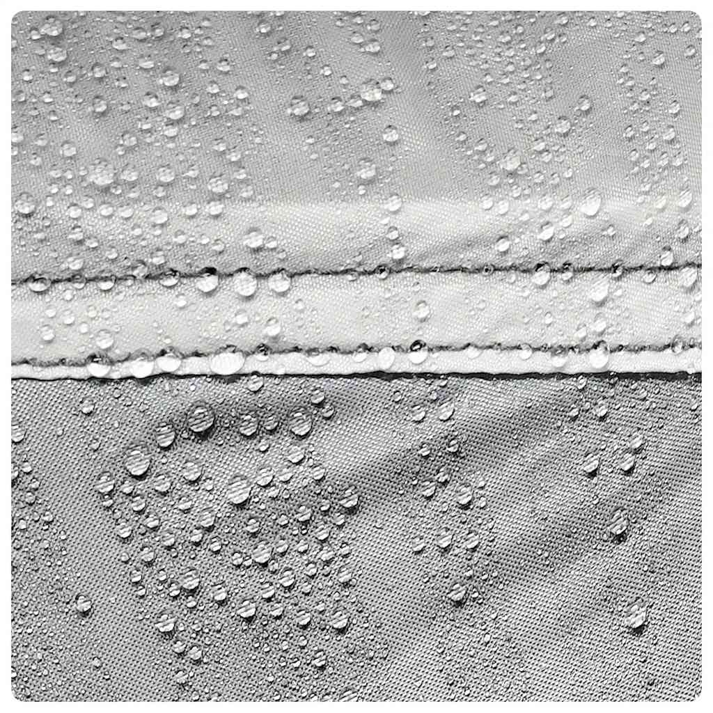 Detail van de waterdichte stof van de vidaXL partytent met waterdruppels.