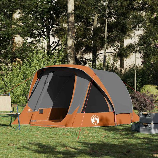 Grijze en oranje vidaXL tent voor vier personen, waterdicht en windbestendig, in een groene omgeving.