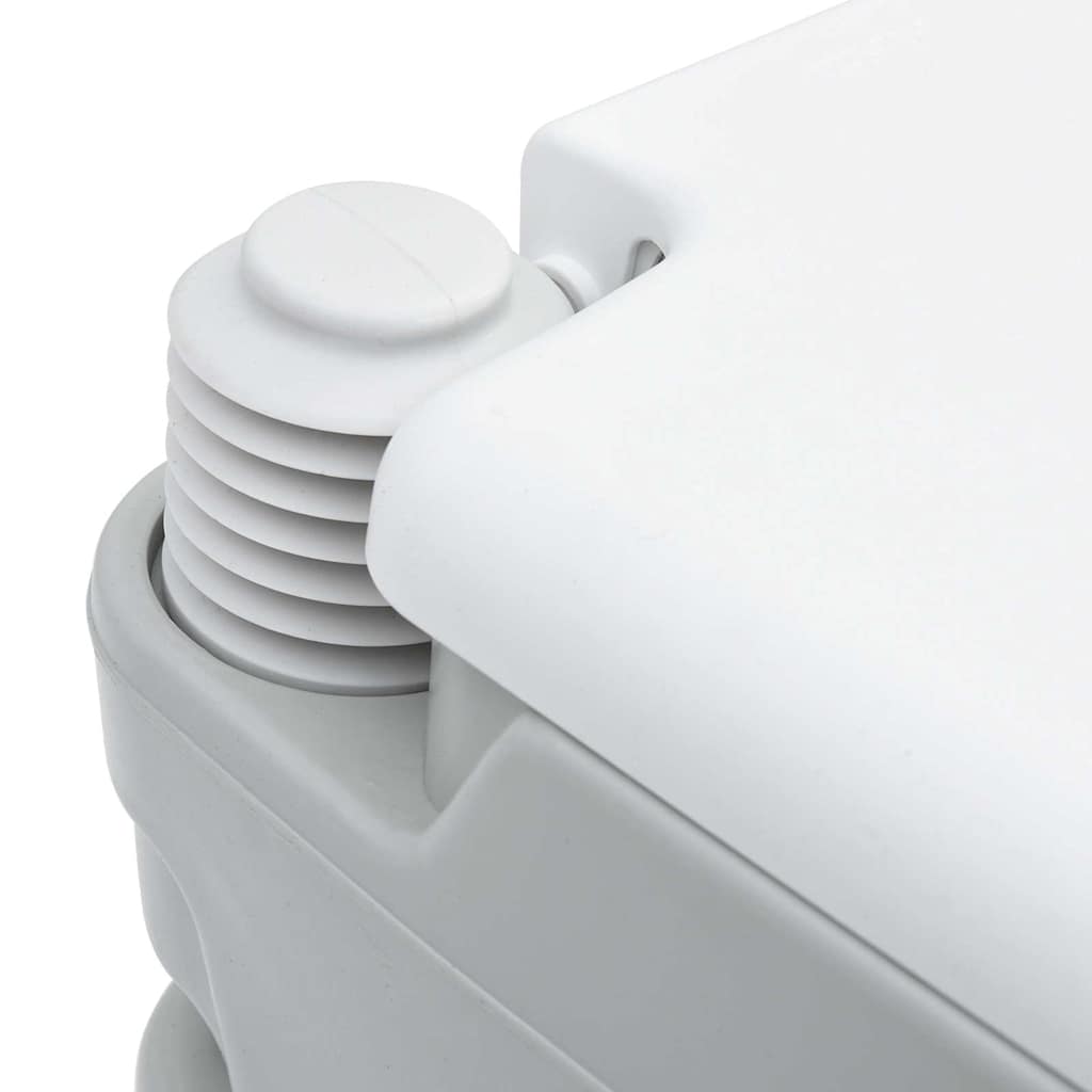 Detail van de bellows-pomp van het vidaXL Camping Toilet in grijs en wit.
